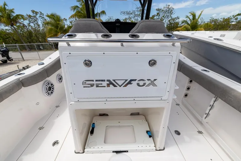 Slide: The Image of 2024 Sea Fox 288 Commander boat interior with seating and storage. - 8