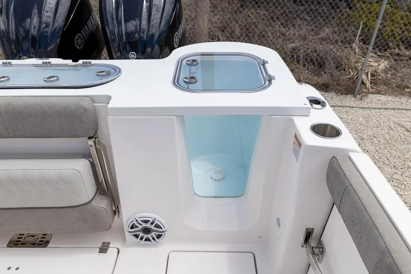Slide: The Image of 2024 Sea Fox 288 Commander boat interior with seating, storage, and livewell. - 9