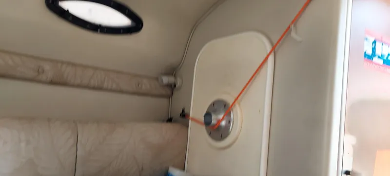 Slide: The Image of Interior cabin of a 2005 Chaparral Signature 240 boat. - 13