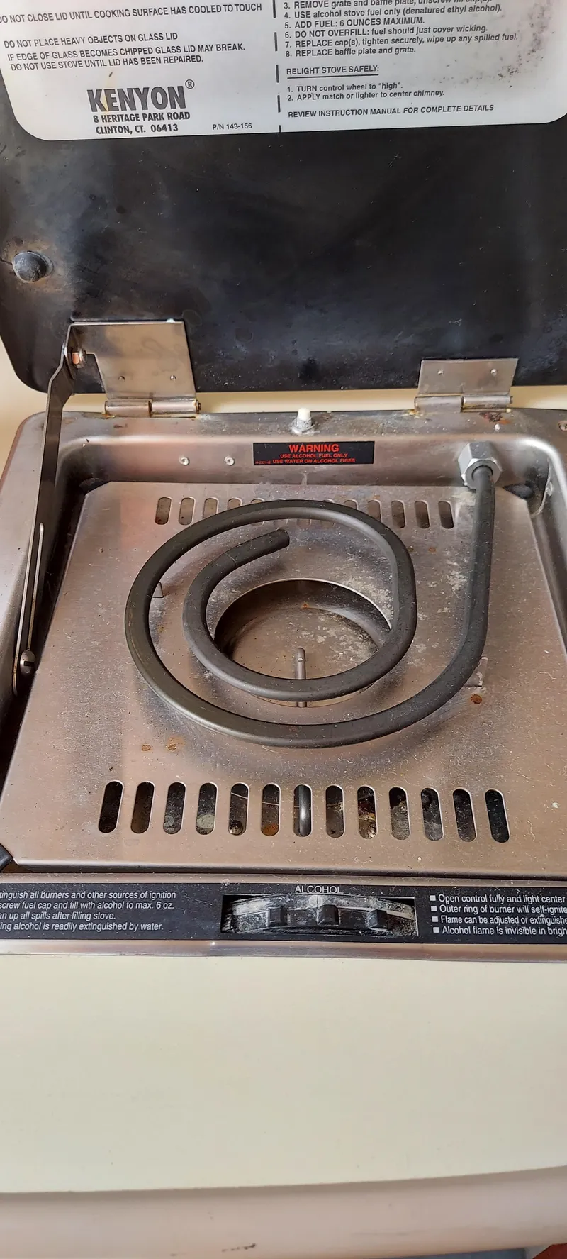 Slide: The Image of Electric stove in a 2005 Chaparral Signature 240 boat. - 23