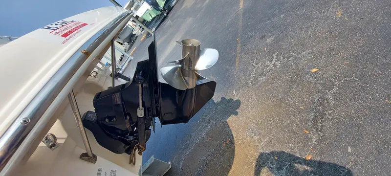 Slide: The Image of 2005 Chaparral Signature 240 boat propeller and stern drive on pavement. - 29