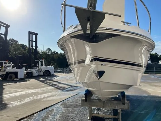 Slide: The Image of 2005 Chaparral Signature 240 boat on a lift, ready for maintenance. - 35