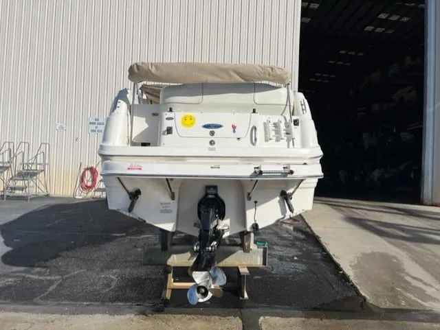 Slide: The Image of 2005 Chaparral Signature 240 boat stern view in storage facility. - 36