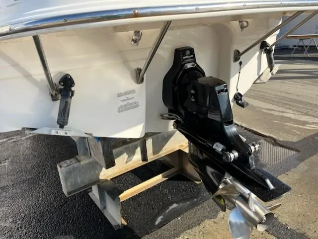 Slide: The Image of 2005 Chaparral Signature 240 boat stern with outboard motor on trailer. - 39