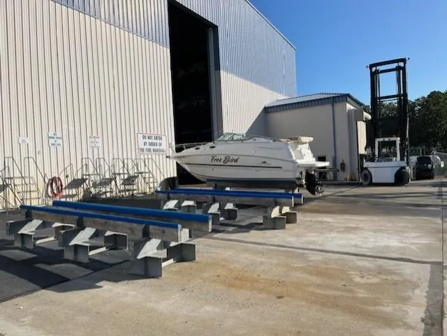 Slide: The Image of 2005 Chaparral Signature 240 boat outside a storage facility. - 40