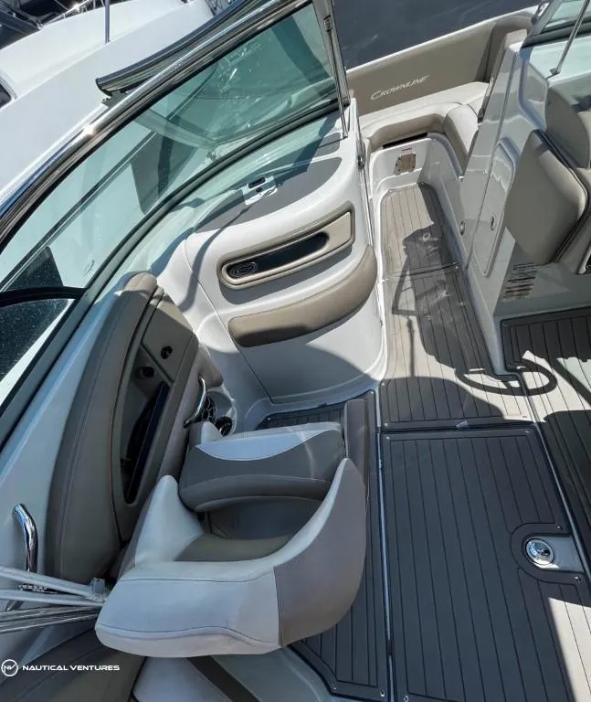 Slide: The Image of 2019 Crownline Eclipse E235 XS boat interior with seating and deck. - 11
