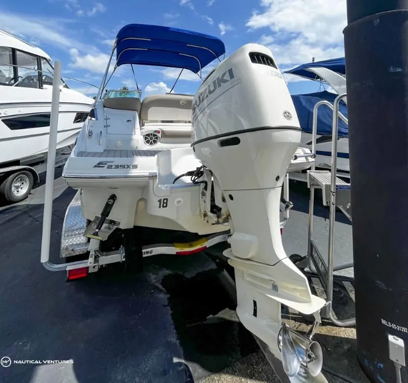 Slide: The Image of 2019 Crownline Eclipse E235 XS boat with Suzuki outboard motor. - 15