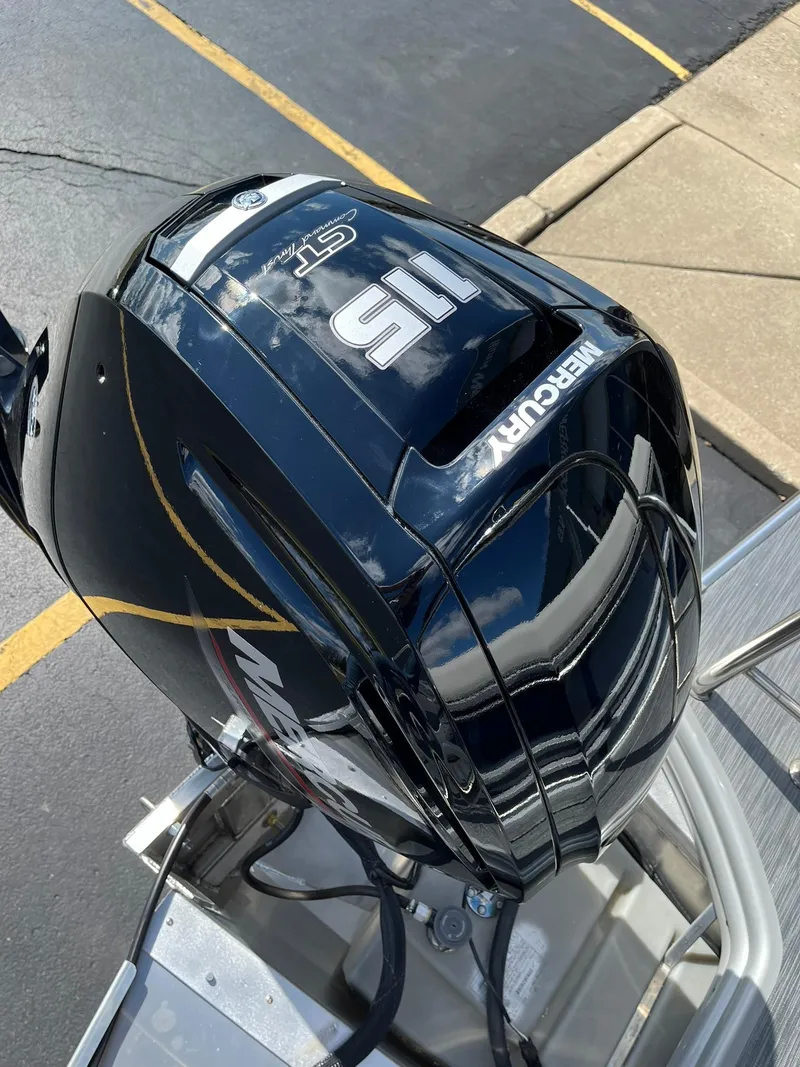 Slide: The Image of 2024 Lowe SS 210 boat with a Mercury 115 outboard motor. - 20