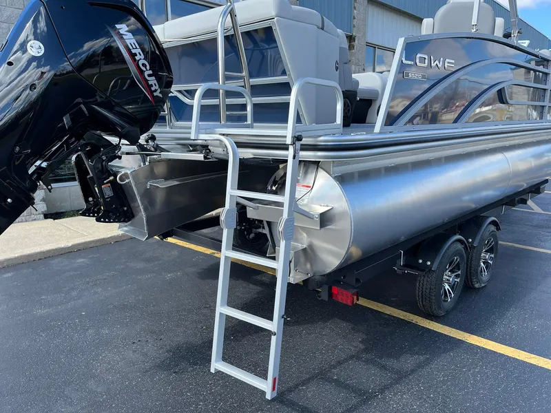 Slide: The Image of 2024 Lowe SS 210 pontoon boat with Mercury outboard motor and boarding ladder. - 21