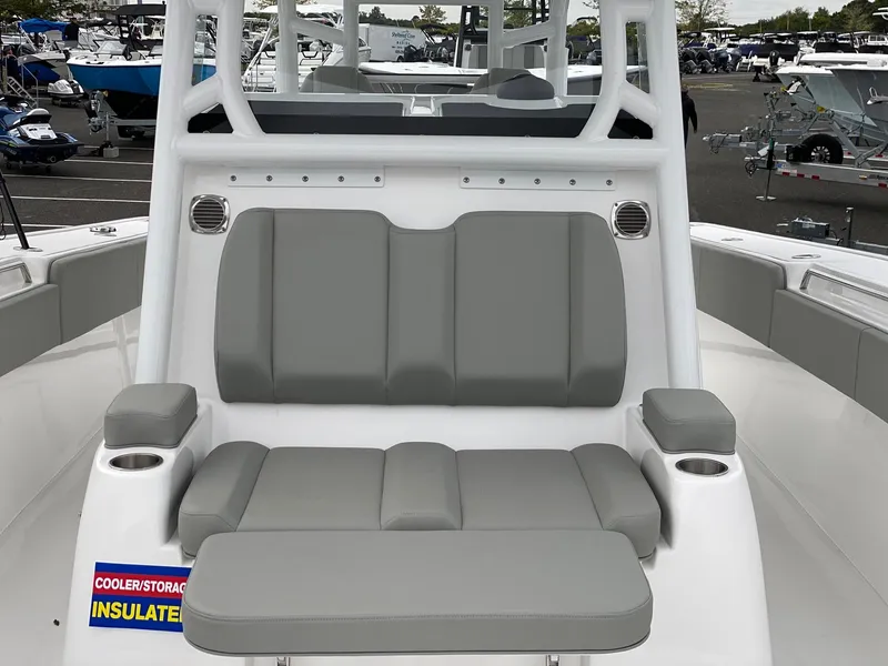 Slide: The Image of 2024 Cape Horn 36 XS boat with cushioned seating and insulated cooler/storage. - 13