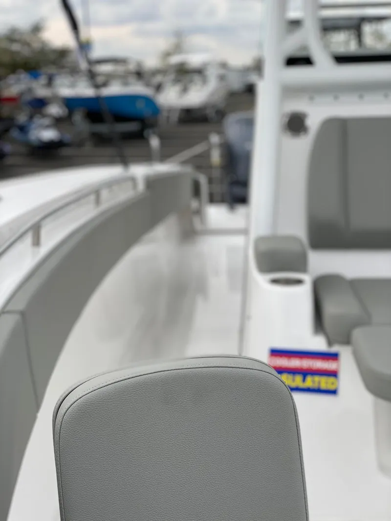 Slide: The Image of 2024 Cape Horn 36 XS boat interior with gray seating and modern design. - 14