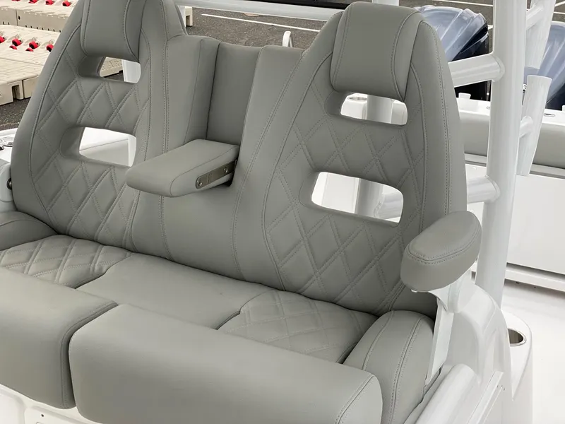 Slide: The Image of Luxurious seating on 2024 Cape Horn 36 XS boat with diamond-stitched gray upholstery. - 16