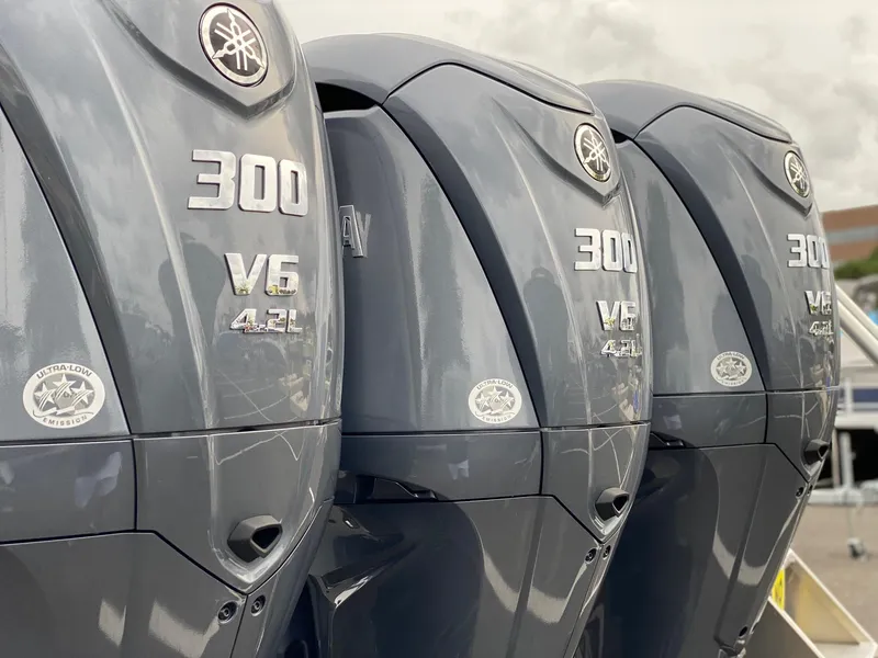 Slide: The Image of Triple Yamaha 300 V6 4.2L outboard engines on a 2024 Cape Horn 36 XS boat. - 3