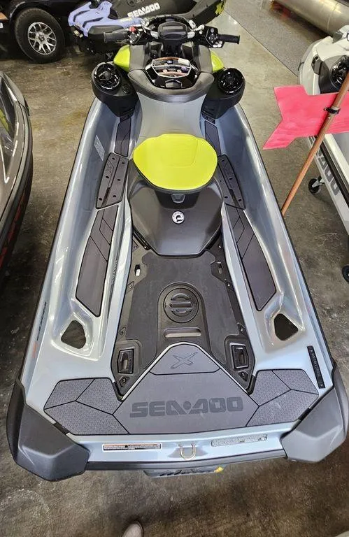 Slide: The Image of 2024 Sea-Doo RXP-X 325 iBR in Ice Metal/Green Tech with BRP Premium Audio. - 3