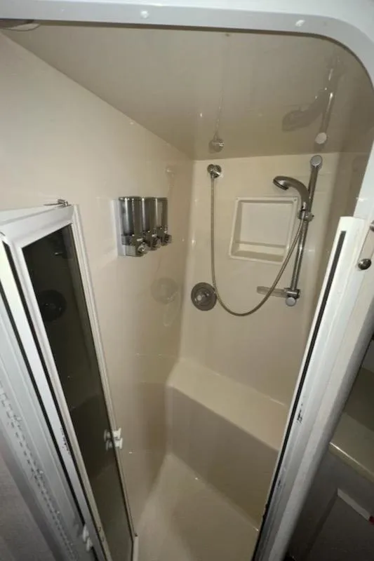 Slide: The Image of 2000 Viking 50 Express boat shower with modern fixtures and compact design. - 17