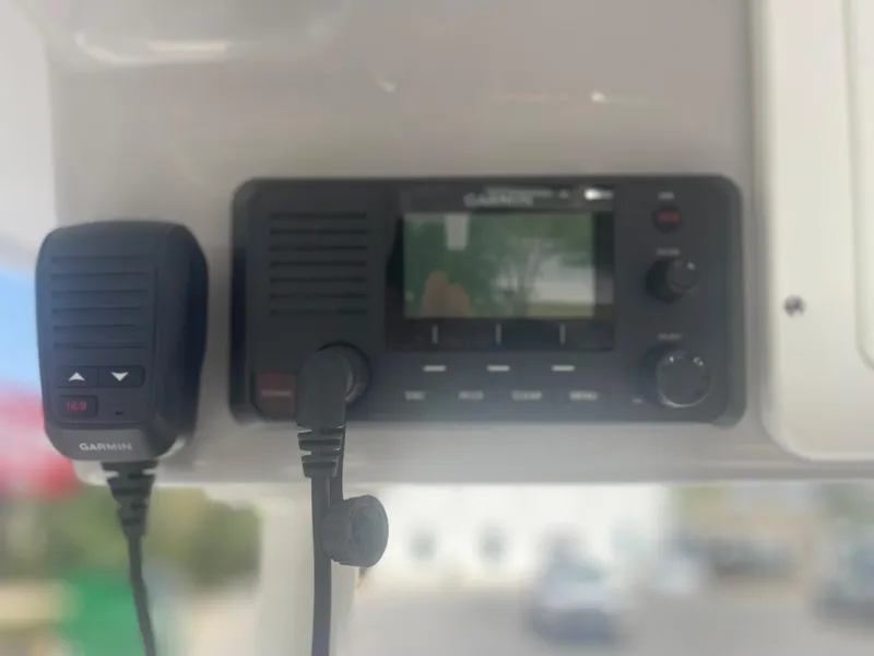 Slide: The Image of Garmin marine radio on 2024 Sea Born LX 24 boat. - 7