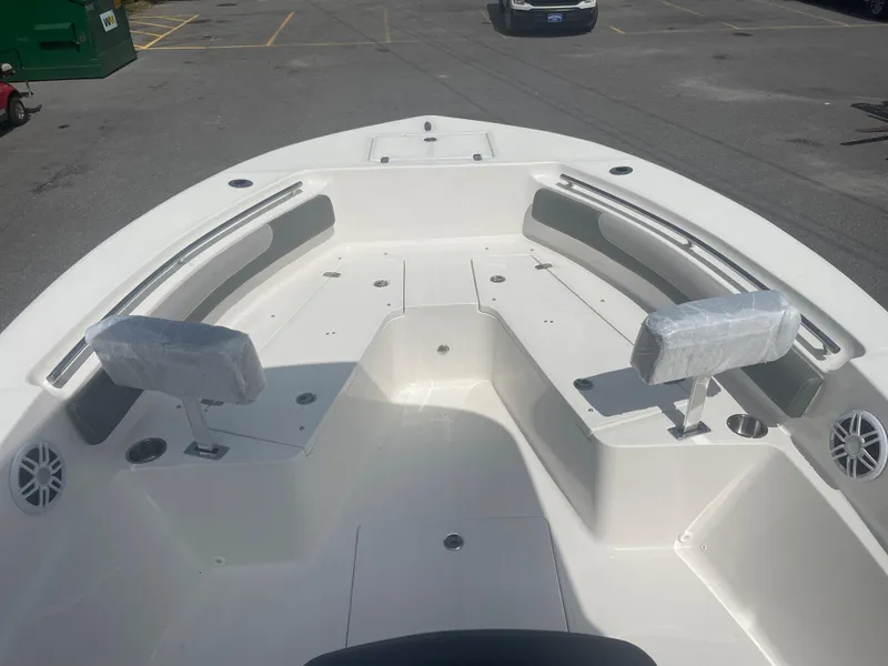Slide: The Image of 2024 Sea Born LX 24 boat interior, spacious seating and storage. - 8