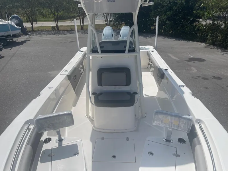 Slide: The Image of 2024 Sea Born LX 24 boat interior with seating and console. - 9