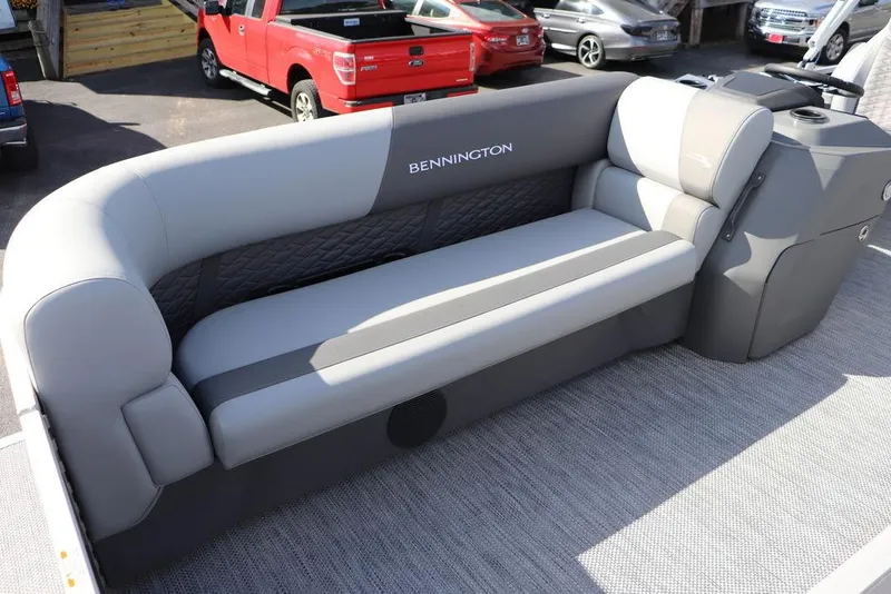 Slide: The Image of 2024 Bennington 20 SL pontoon boat with sleek gray seating. - 7