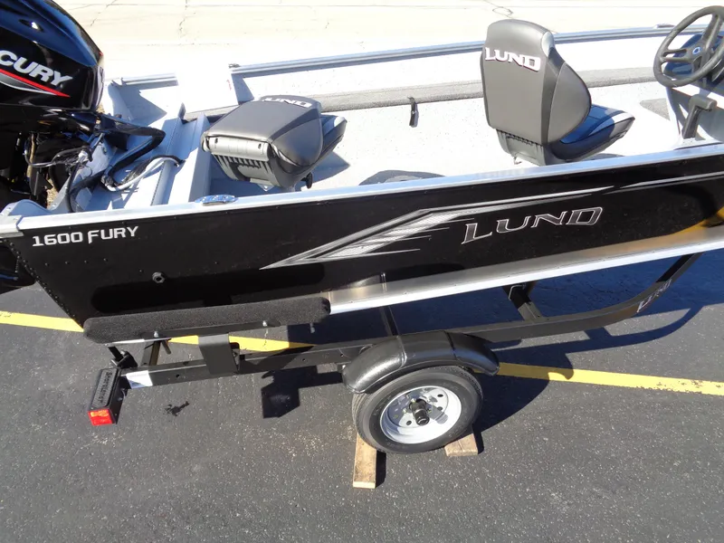 Slide: The Image of 2024 Lund 1600 Fury SS fishing boat on trailer, side view. - 4
