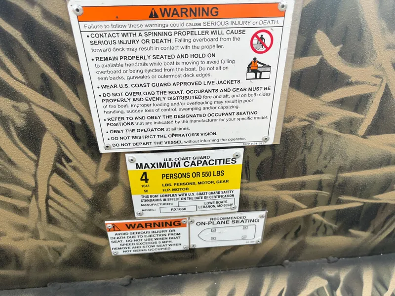 Slide: The Image of 2024 Lowe Roughneck 1660 warning labels and maximum capacity information. - 17