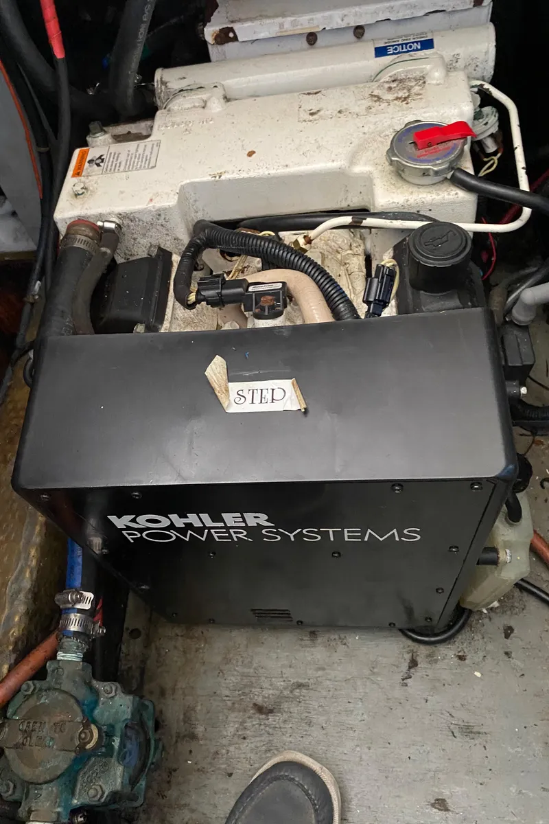 Slide: The Image of Kohler Power Systems generator in a 1977 Jersey Dawn 40 boat. - 12