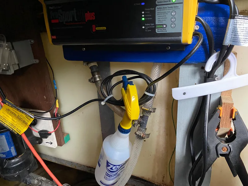 Slide: The Image of Battery charger setup in a 1977 Jersey Dawn 40 boat. - 15