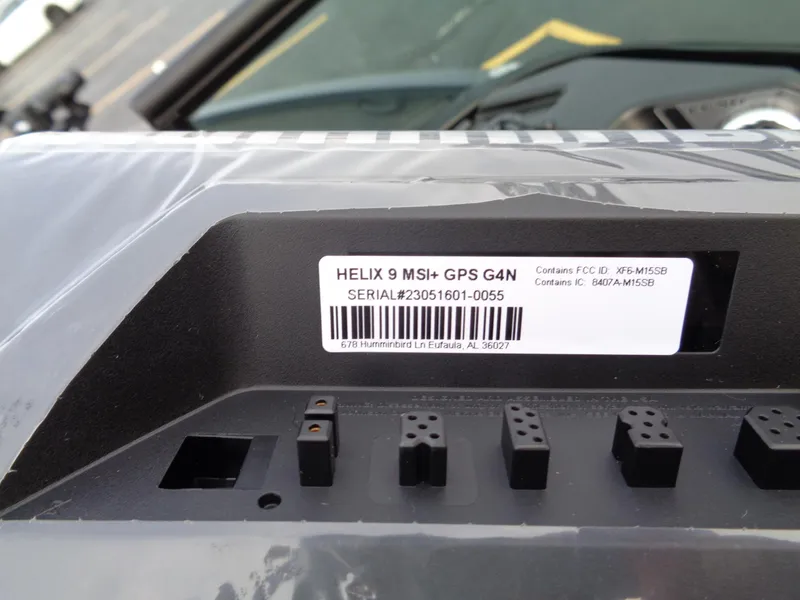 Slide: The Image of Close-up of a HELIX 9 MSI+ GPS G4N device with serial number label. - 15