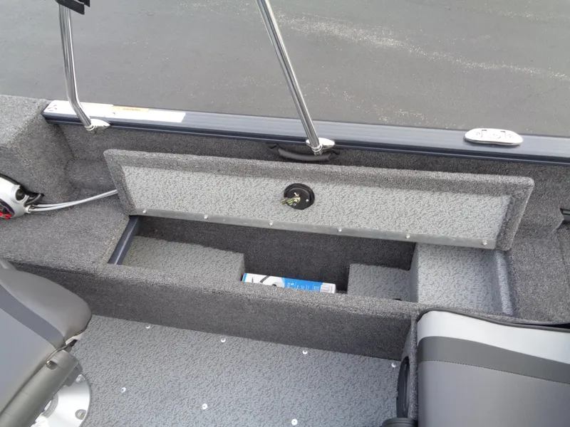Slide: The Image of 2024 Lund 1650 Rebel XL Sport boat interior storage compartment. - 21