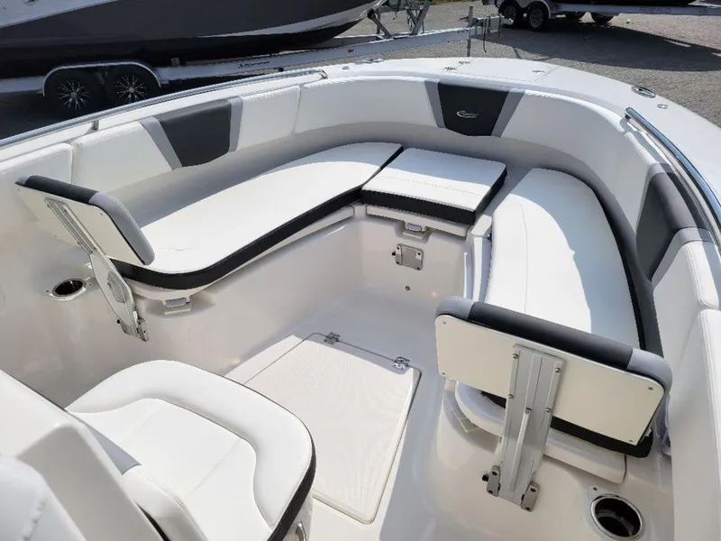Slide: The Image of 2024 Robalo 250 CC boat with spacious seating area. - 10