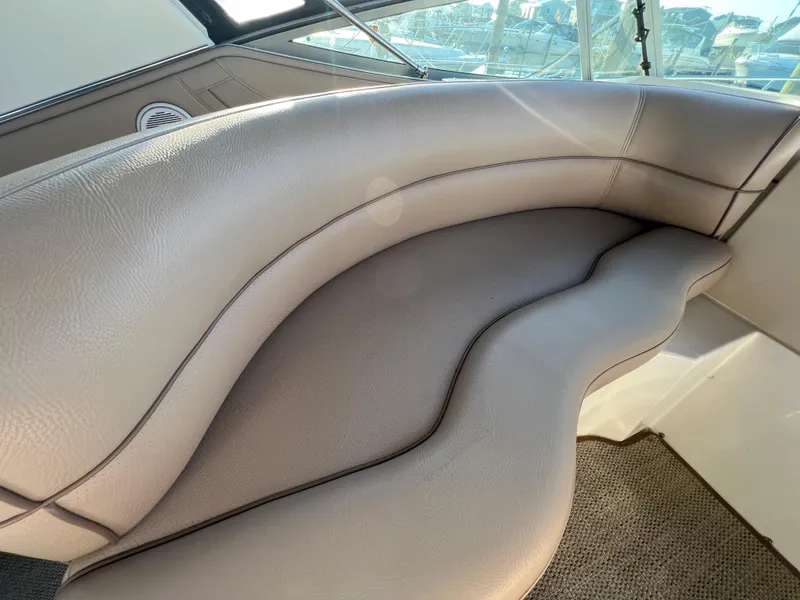 Slide: The Image of 1999 Cruisers Yachts 3575 Esprit interior seating, beige leather upholstery. - 19