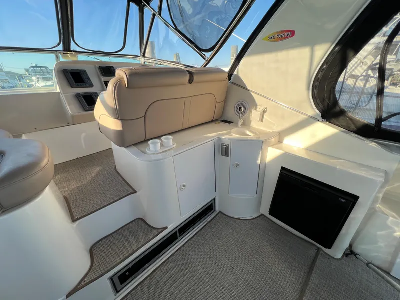 Slide: The Image of 1999 Cruisers Yachts 3575 Esprit interior with seating and storage compartments. - 31