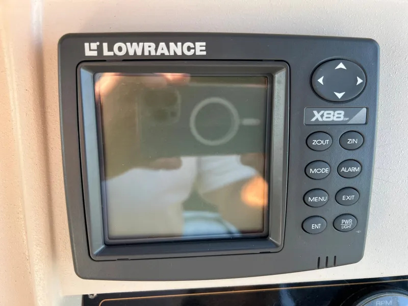 Slide: The Image of Lowrance X88 fishfinder on 1999 Cruisers Yachts 3575 Esprit. - 32
