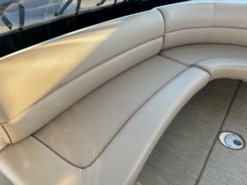 Slide: The Image of 1999 Cruisers Yachts 3575 Esprit boat with beige leather seating and carpeted floor. - 34