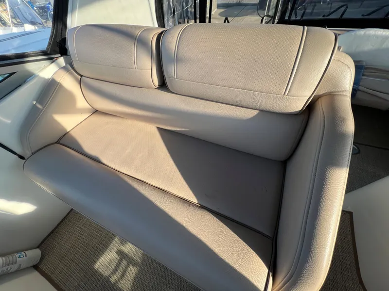 Slide: The Image of 1999 Cruisers Yachts 3575 Esprit beige leather seating in cockpit area. - 20