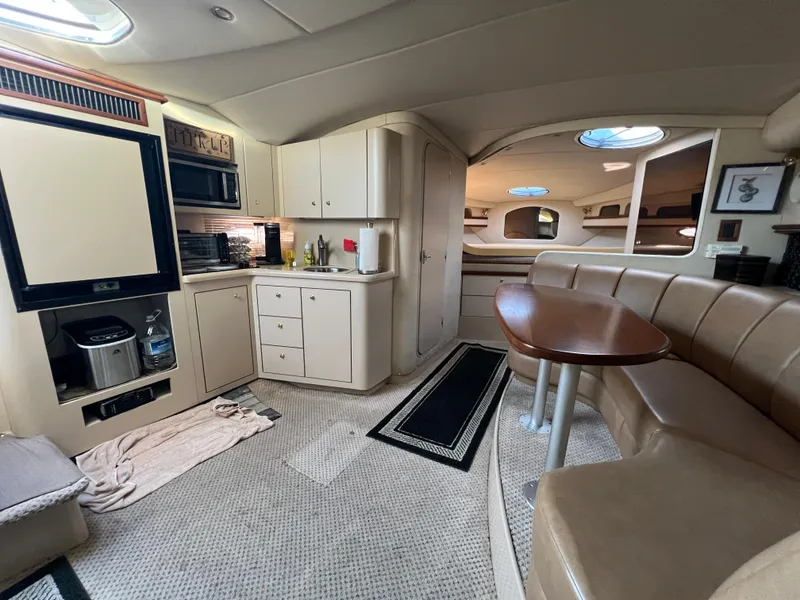 Slide: The Image of 1999 Cruisers Yachts 3575 Esprit interior with kitchen and dining area. - 29