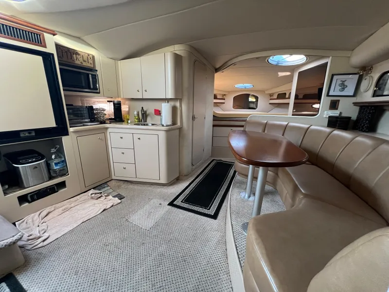 Slide: The Image of 1999 Cruisers Yachts 3575 Esprit interior with kitchen and dining area. - 30