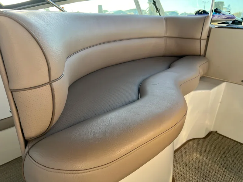 Slide: The Image of 1999 Cruisers Yachts 3575 Esprit interior seating area with beige leather upholstery. - 35