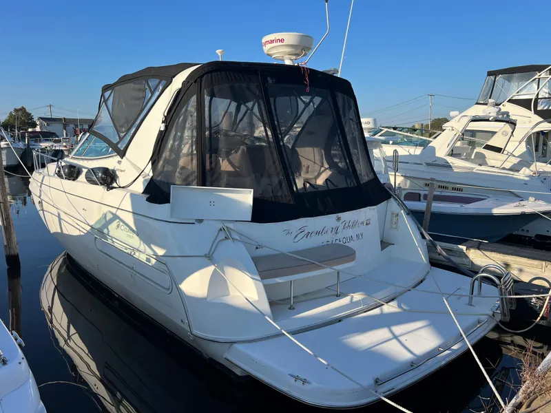 Slide: The Image of 1999 Cruisers Yachts 3575 Esprit docked at marina. - 8