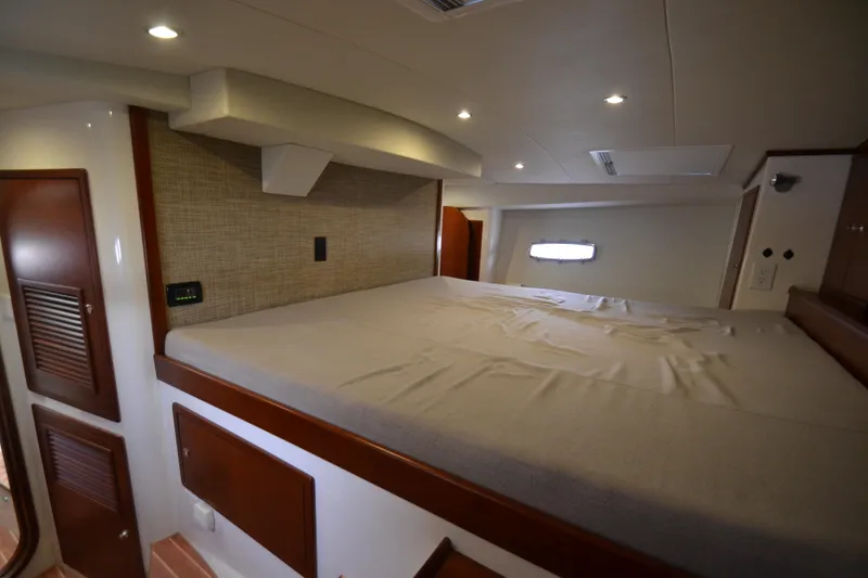 Slide: The Image of Luxurious interior cabin of 2022 ArrowCat 42 Coupe with cozy bed and modern lighting. - 13