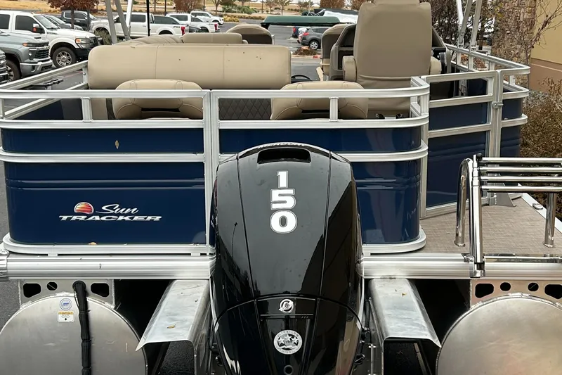 Slide: The Image of 2024 Sun Tracker Fishin' Barge 22 XP3 pontoon boat with 150 HP Mercury engine. - 3