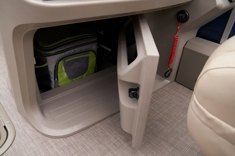 Slide: The Image of Storage compartment on the 2024 Sun Tracker Fishin' Barge 22 XP3. - 38