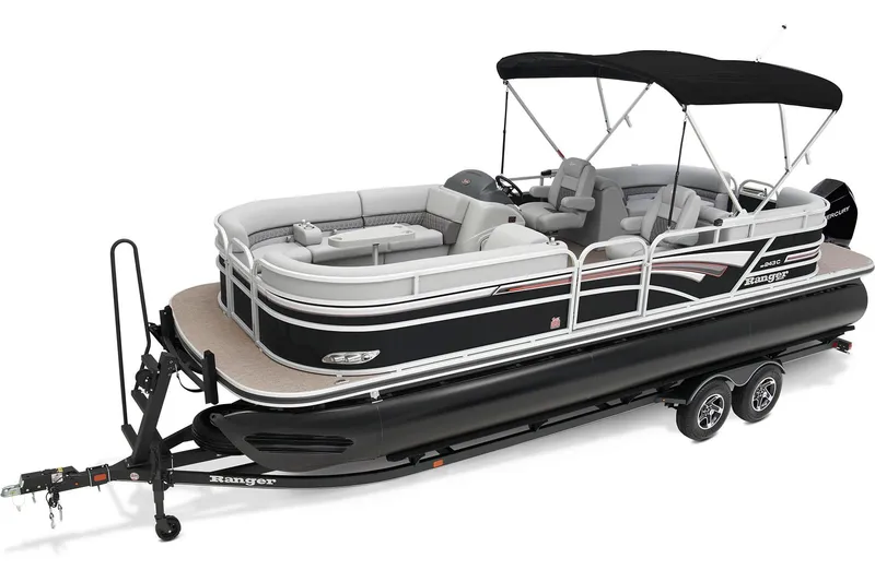 Slide: The Image of 2024 Ranger Reata 243C pontoon boat interior with plush seating and wood-style flooring. - 4