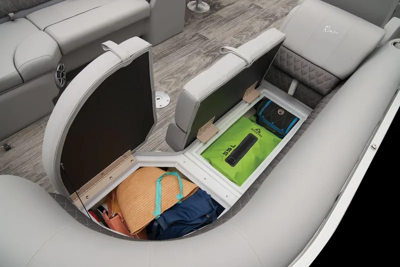 Slide: The Image of 2024 Ranger Reata 243C boat captain's chair and steering console. - 48