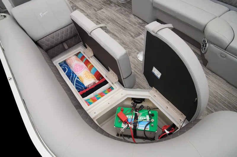 Slide: The Image of Dashboard of 2024 Ranger Reata 243C with phone charging and audio system. - 53