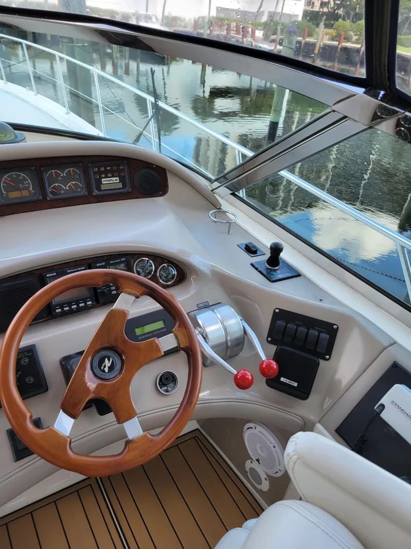 Slide: The Image of Helm of 2000 Sea Ray 540 Sundancer yacht with wooden steering wheel. - 16