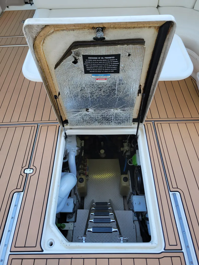 Slide: The Image of Engine compartment of a 2000 Sea Ray 540 Sundancer yacht. - 21