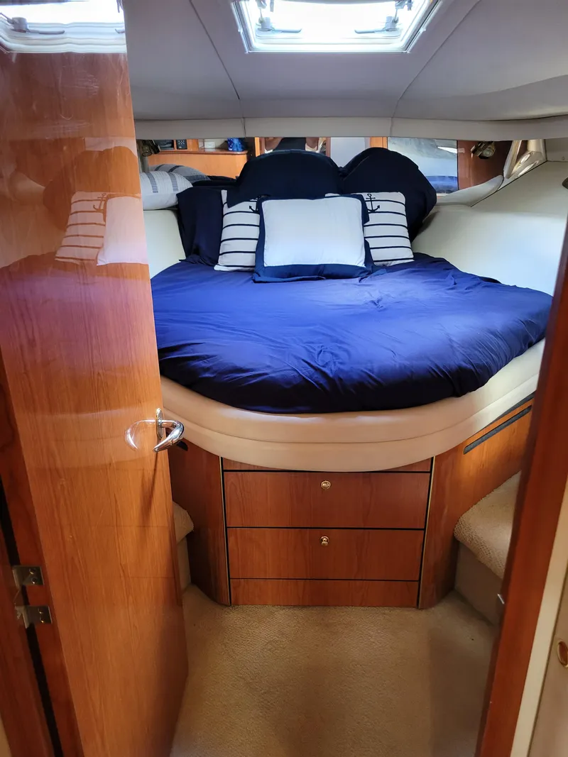 Slide: The Image of Luxurious bedroom interior of a 2000 Sea Ray 540 Sundancer yacht. - 45
