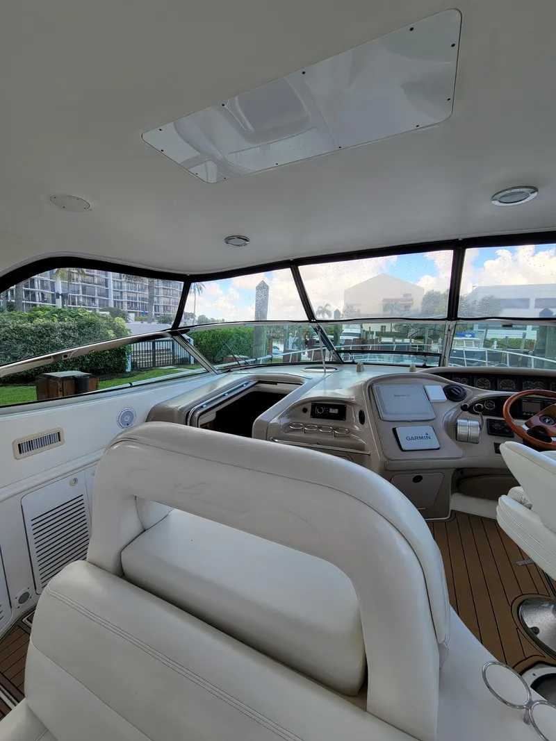 Slide: The Image of Interior view of 2000 Sea Ray 540 Sundancer yacht cockpit. - 8