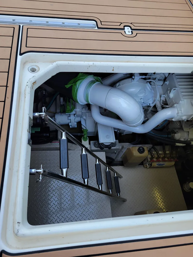 Slide: The Image of Engine compartment of a 2000 Sea Ray 540 Sundancer yacht. - 22